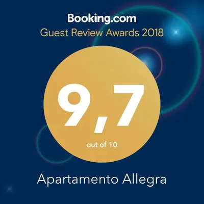 Certificado, premio, señal o documento que está expuesto en Apartamento Allegra