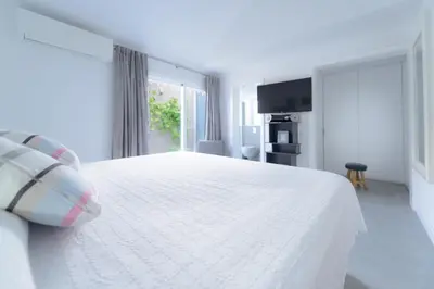 Cama o camas de una habitación en Villa Palmera