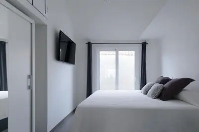 Cama o camas de una habitación en Villa Palmera