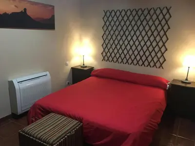 Cama o camas de una habitación en Villa Rafael