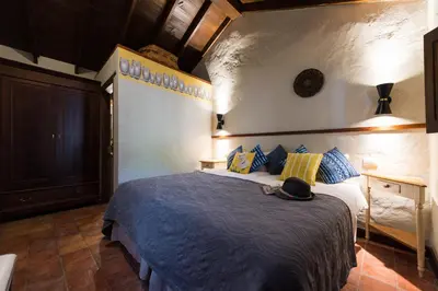 Cama o camas de una habitación en Bohemian Hideaway Finca - 2 unique houses with shared pool