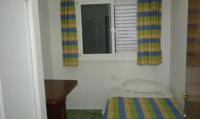 Cama o camas de una habitación en Pension Alvarez