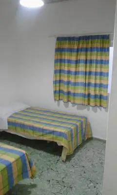 Cama o camas de una habitación en Pension Alvarez
