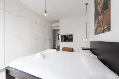 Cama o camas de una habitación en BUNGALOW BAHÍA MELONERAS