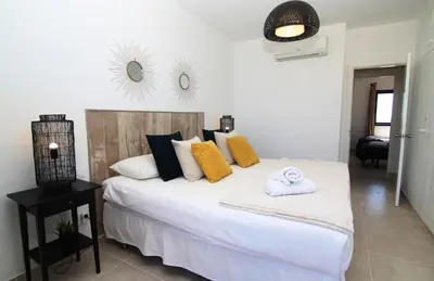 Cama o camas de una habitación en Bahia Meloneras
