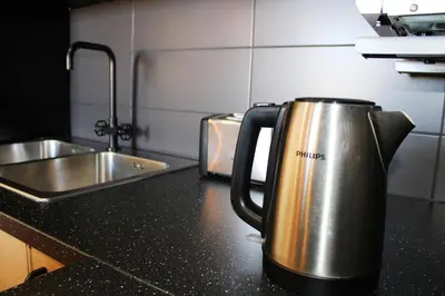 Una cocina o zona de cocina en Ocean Friendly Holiday Home