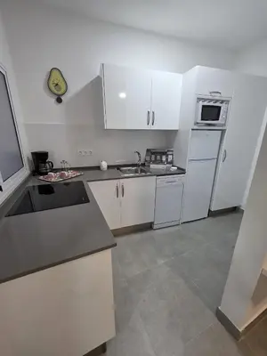 Una cocina o zona de cocina en The blue house las Canteras