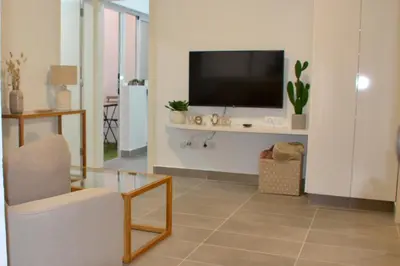 Una televisión o centro de entretenimiento en The blue house las Canteras
