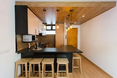 Una cocina o zona de cocina en Palm Friendly Holiday Home