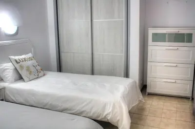 Cama o camas de una habitación en Bungalows Los Melocotones