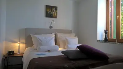 Cama o camas de una habitación en Birdcage Gay Men Resort and Lifestyle Hotel