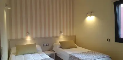 Cama o camas de una habitación en Villa Montegolf