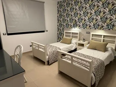 Cama o camas de una habitación en Villa Montegolf
