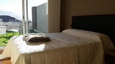 Cama o camas de una habitación en Él Rome Duplex