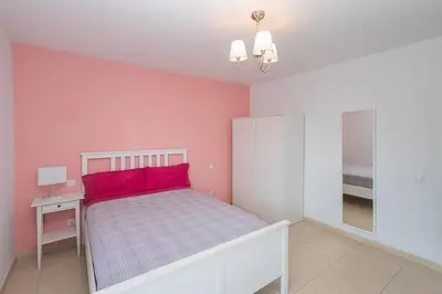 Cama o camas de una habitación en GuestReady - Tarantos Amplitud y sol a un paso del mar