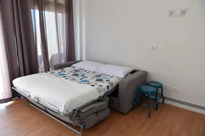Cama o camas de una habitación en Apartamento Primera Línea Playa de Las Canteras