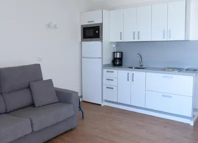 Una cocina o zona de cocina en Apartamento Primera Línea Playa de Las Canteras