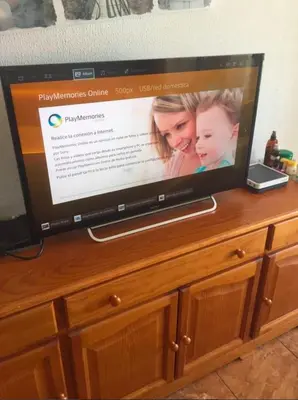 Una televisión o centro de entretenimiento en Apartment Yumbo Centrum