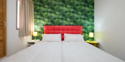 Cama o camas de una habitación en Bungalows Artemisa Gay Men Only