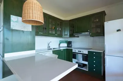Una cocina o zona de cocina en Gran terraza con vistas al mar