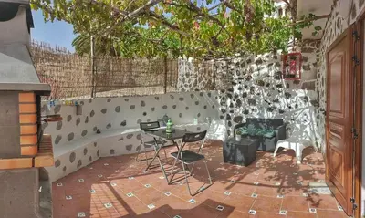 Un patio o zona al aire libre en Casas Blancas - Suite 2