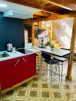 Una cocina o zona de cocina en Vacacionales Vegueta