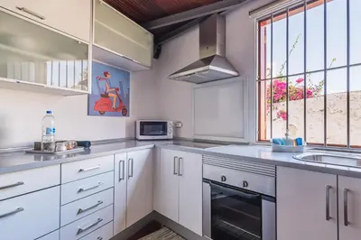 Una cocina o zona de cocina en Loft La Fuente