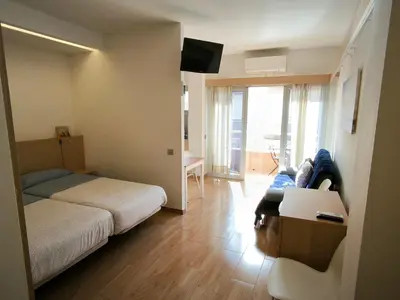 Cama o camas de una habitación en Relax and Beach