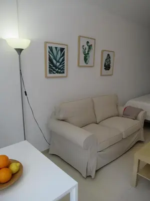 Zona de estar de Vivelorural Apartamento Canteras vista mar lateral