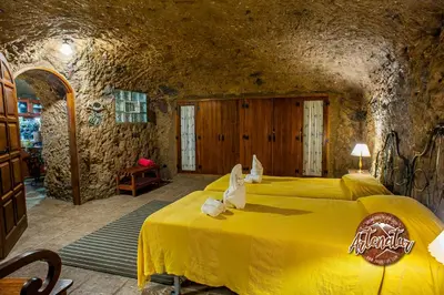 Cama o camas de una habitación en Casa Cueva El Mimo By Artenatur