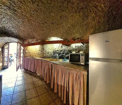 Una cocina o zona de cocina en Casa Cueva El Mimo By Artenatur