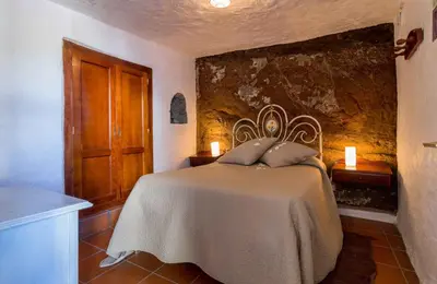 Cama o camas de una habitación en Casa Cueva El Caidero By Artenatur