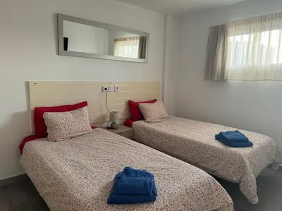 Cama o camas de una habitación en Apartamento con Vistas al Mar
