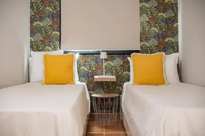 Cama o camas de una habitación en El ático de Concha