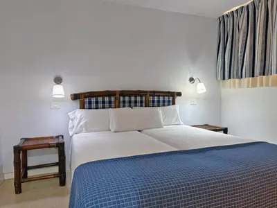 Cama o camas de una habitación en Apartamentos Portonovo
