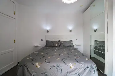 Cama o camas de una habitación en Best House Beachview Haven 1-BR