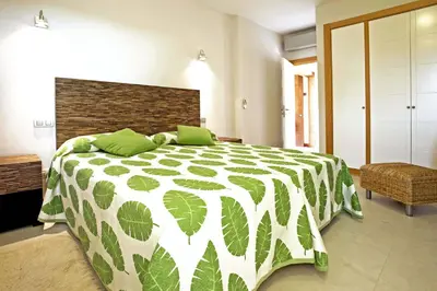 Cama o camas de una habitación en Salobre Vista Golf 19