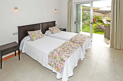 Cama o camas de una habitación en Salobre Vista Golf 29