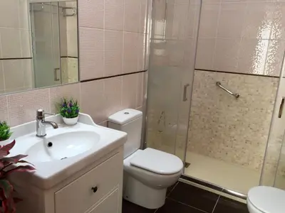 Un baño de Pozo Izquierdo Global Paradise