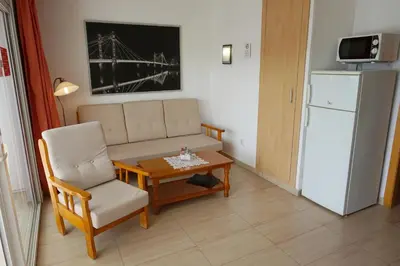 Una cocina o zona de cocina en Apartamentos Ecuador