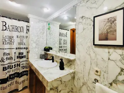 Un baño de M&F Golf Views. Walk to Beach