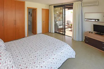 Cama o camas de una habitación en Salobre Las Terrazas 10