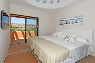 Cama o camas de una habitación en Salobre Cardón