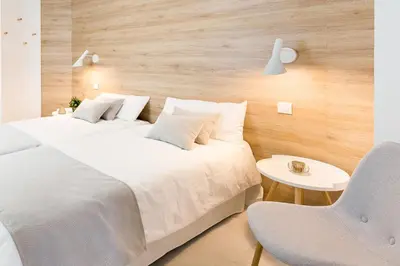 Cama o camas de una habitación en Plaza de La Feria Premium Apartments