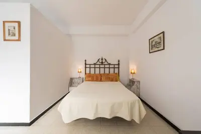 Cama o camas de una habitación en Loft luminoso y amplio muy cerca de Las Canteras