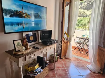 Una televisión o centro de entretenimiento en Casa Fuente Hervera