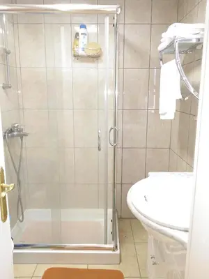 Un baño de Apartamentos Iguazu - Yumbo
