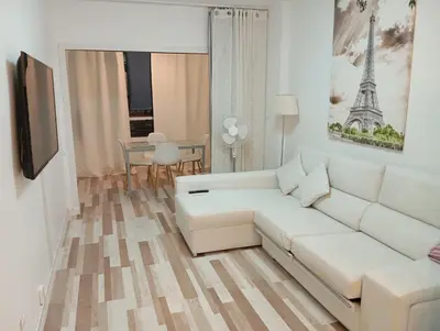 Una televisión o centro de entretenimiento en Apartamentos Iguazu - Yumbo