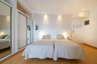Cama o camas de una habitación en Apartamentos Maype Canteras