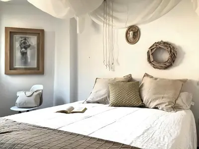 Cama o camas de una habitación en Voyage Las Canteras Beach & Parking